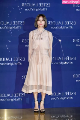 Jihyo - Heels and a mini dress aren t ideal choices for hiking  but they make