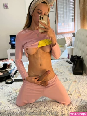 palomaveiga - Topless in a bright pink thong ..