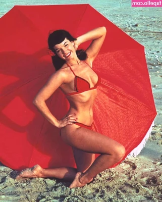 Bettie Page [ bettie-page ] - Tanning this juicy