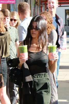 Kourtney Kardashian [ kourtney-kardashian ] - What do you love more  cats or dogs