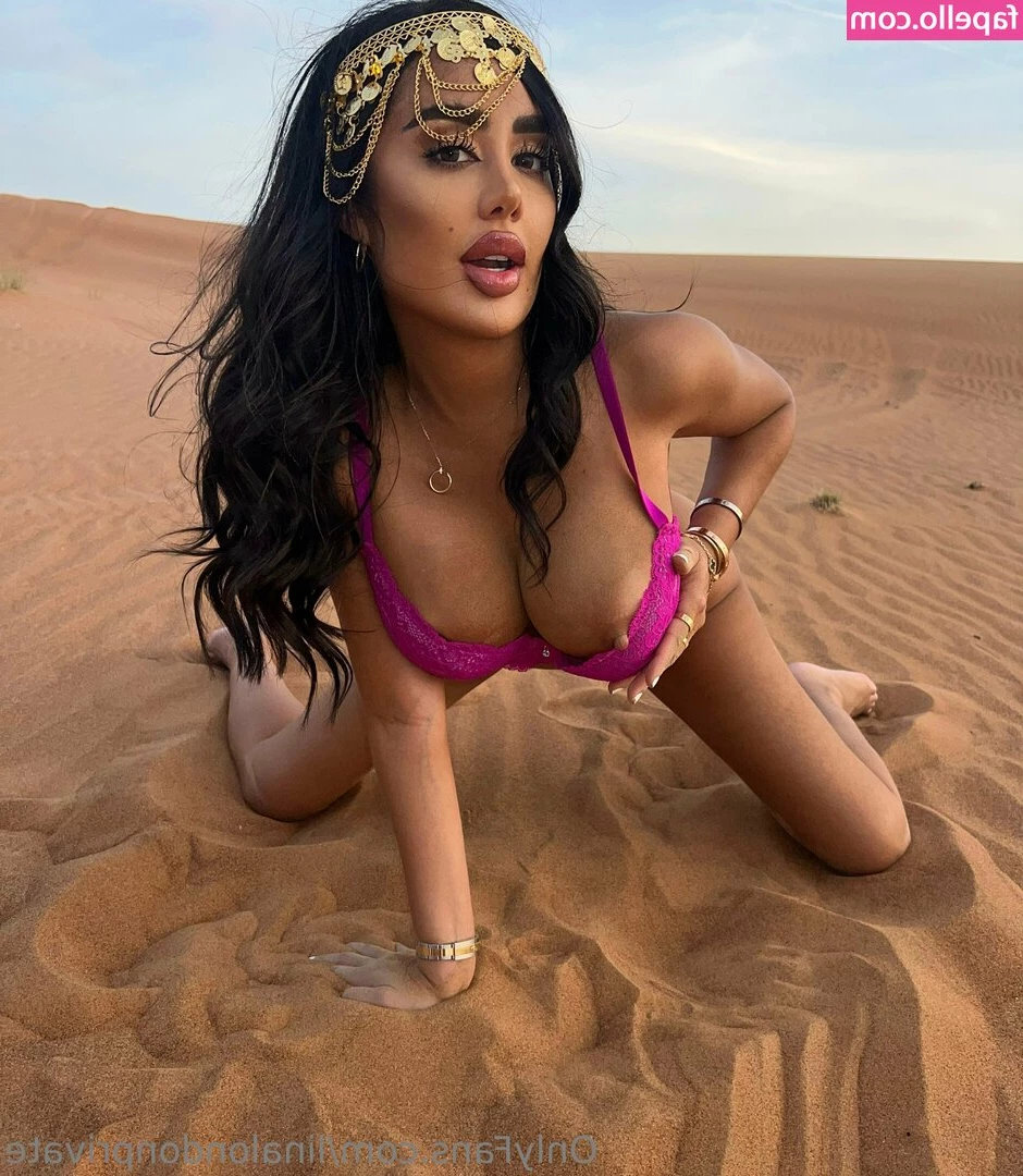 Lina London [ lina-london ] - If you can make through all the posing  there s a tittie flash at the