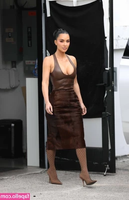 Kim Kardashian [ kim-kardashian-1 ] - this skirt might be too short...