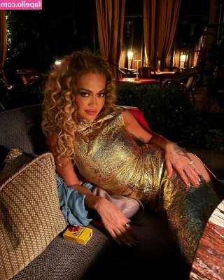 Rita Ora [ rita-ora ] - Love these waders  they keep the dirt off my knees while I m getting