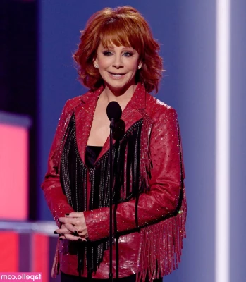Reba McEntire [ reba-mcentire ] - A bit of nudity  Oh  and a Christmas hat  Because it s nearly