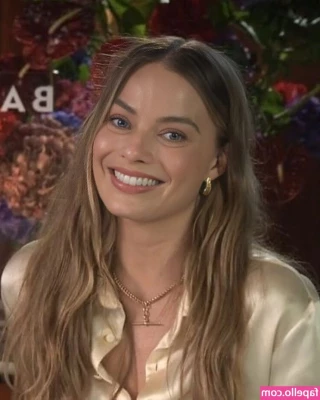 Margot Robbie [ margot-robbie ] - Should I keep this red tights or take it off? 🫣❤️‍🔥