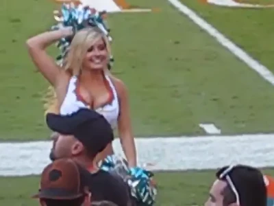  [ sexy-cheerleaders ] - Wearing booty shorts and a Ta Ta Bra