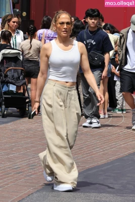 Jennifer Lopez [ jennifer-lopez ] - grandpa sweaters are my favorite 😌