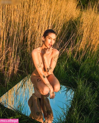 Lotta.m [ lotta-m ] - Boobs  Cleavage  no bra  hand covering nipples   CurvyWomen  