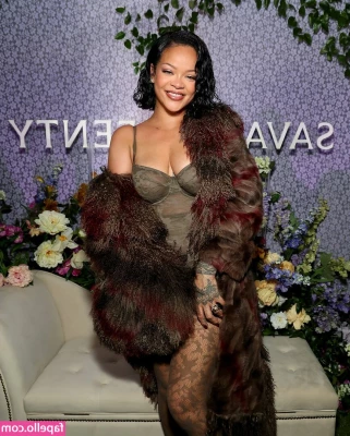 Rihanna - Sometimes I like hiding my big fake titties under a big sweater like