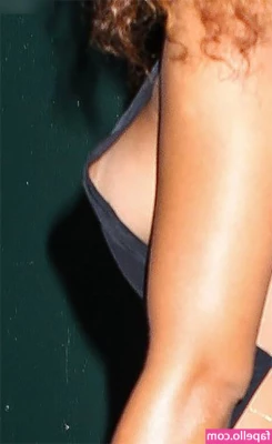 Rihanna - Trying to keep the Florida tan going