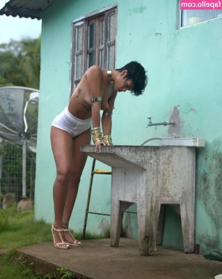 Rihanna - Would you eat me out  The unobstructed version below might help you