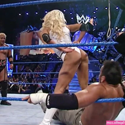 Torrie Wilson [ torrie-wilson ] - Unlock for the unedited version of those pics and get 5 more pics and
