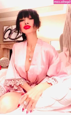 Bai Ling [ bai-ling ] - Yep  I am standing on a coffee table  anything for a good shot eh