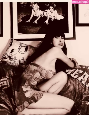 Bai Ling [ bai-ling ] - One guess what that is on my chest… 😏