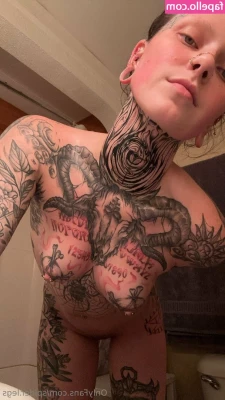 Tatt Tits [ tatt-tits ] - Ho  Ly  Shit  Just put in headphones and watched a poppers trainer