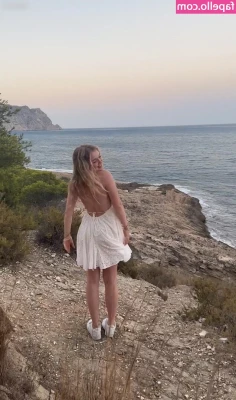 Chiara Tews [ chiara-tews ] - Purple dress and high heels outdoors in the courtyard flexing big