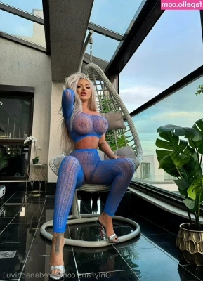 Loredana Chivu [ loredana-chivu ] - She’s a bold one to wear an ensemble like that to work, but,