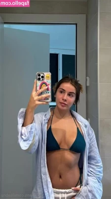 Isa Brunelli [ isa-brunelli-1 ] - I can't actually wear bikinis like this all day on the beach. The part 1
