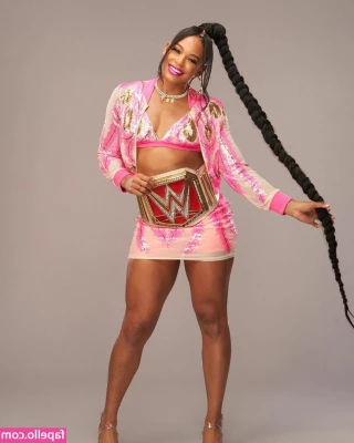 Bianca Belair [ bianca-belair ] - The All New PTA President Smurfy Doll  This mama is ready for the