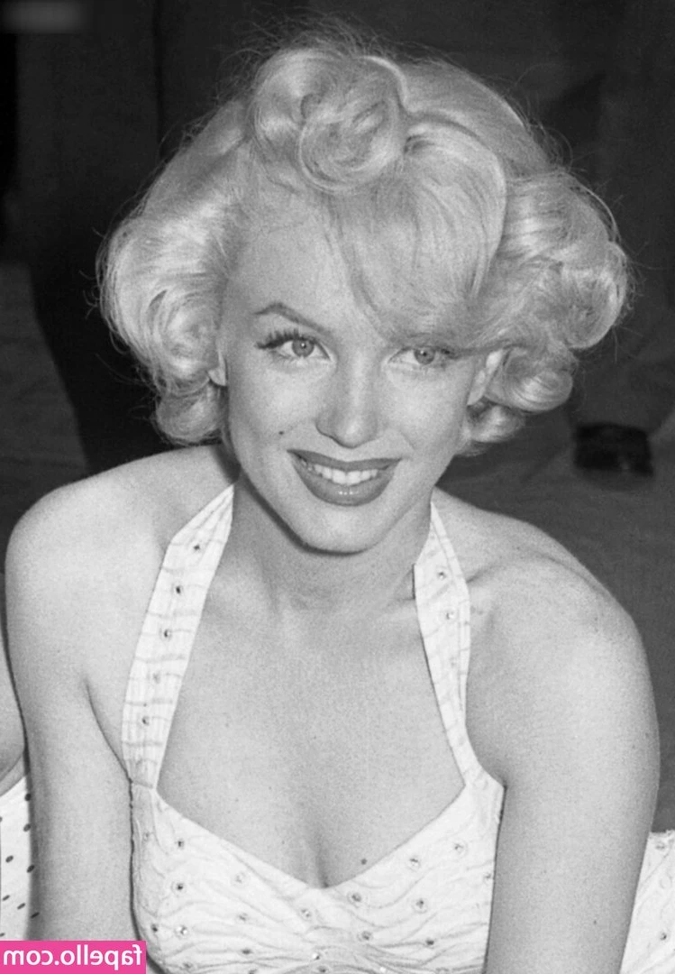 Marilyn Monroe [ marilyn-monroe-1 ] - I lay in front of him  my boots still on  my breasts in full view 